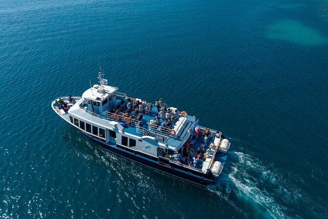 Mediterranean Coastal Sightseeing Cruise from Nice - Villefranche-sur-Mer bay: yachts, color, and a tighter harbor feel