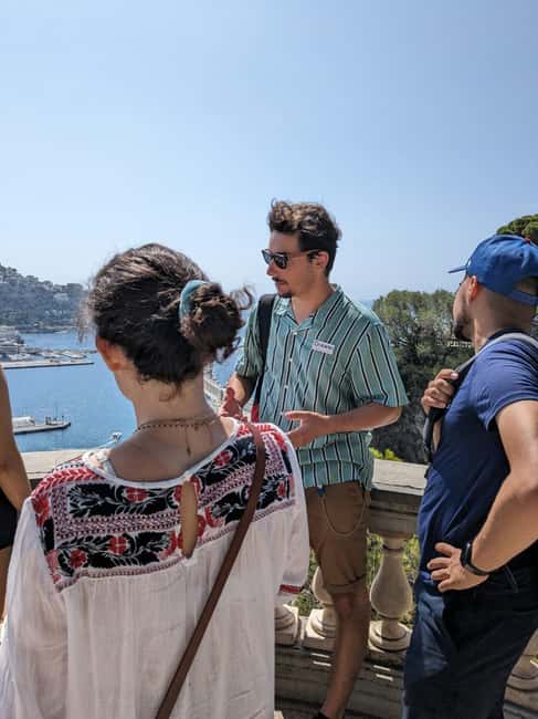 Nice: Sightseeing Walking Tour with certified tour guide - Waterfront Photo Energy: Quai des États-Unis, Bellanda Tower, and Port Views