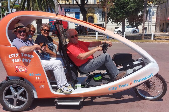 Nice: Visit of Nice by electrically assisted bike taxi 1 hour. - Quai des États-Unis, Memorial, and the View Shift Toward the Sea