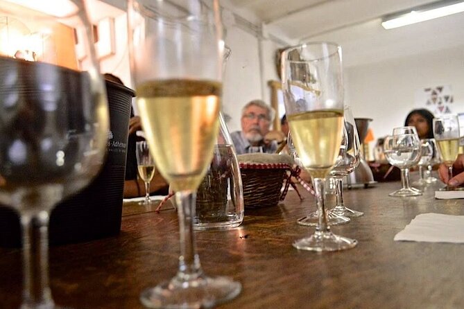 Organic Wine Tasting in Nice - Entering the Libération warehouse for your organic wine lesson